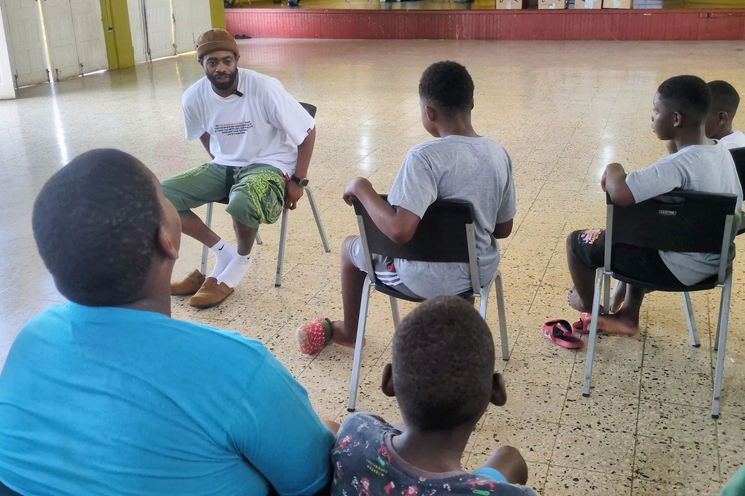 Mentor leading youth group discussion